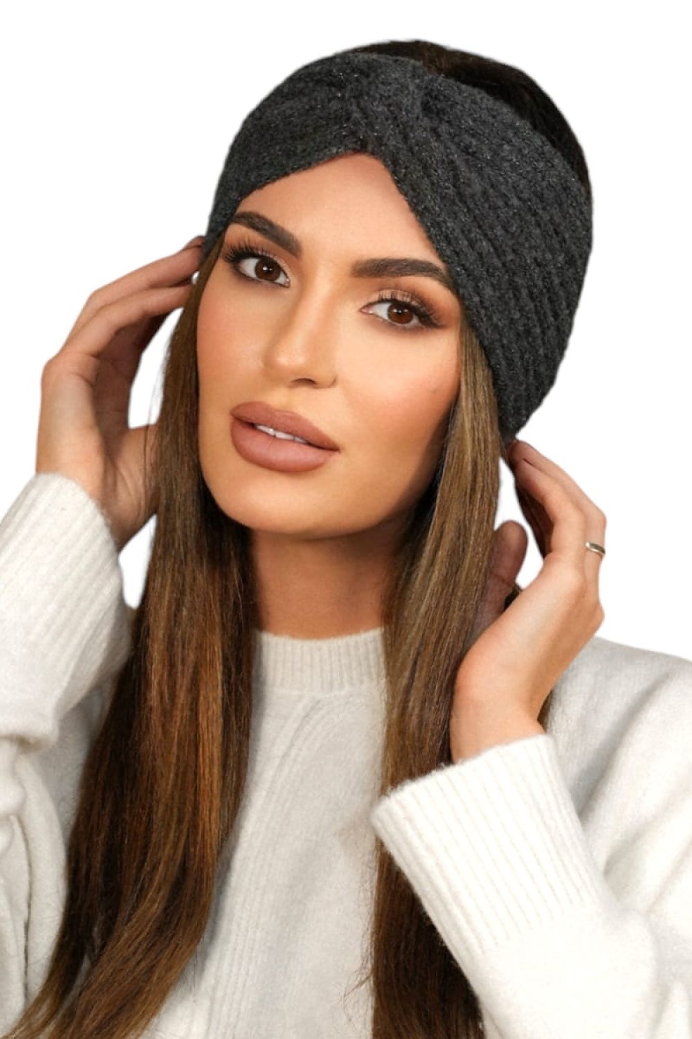 Close-up view of the stylish swirl design on Kamea's navy blue women's headband, showcasing intricate detailing and quality craftsmanship.