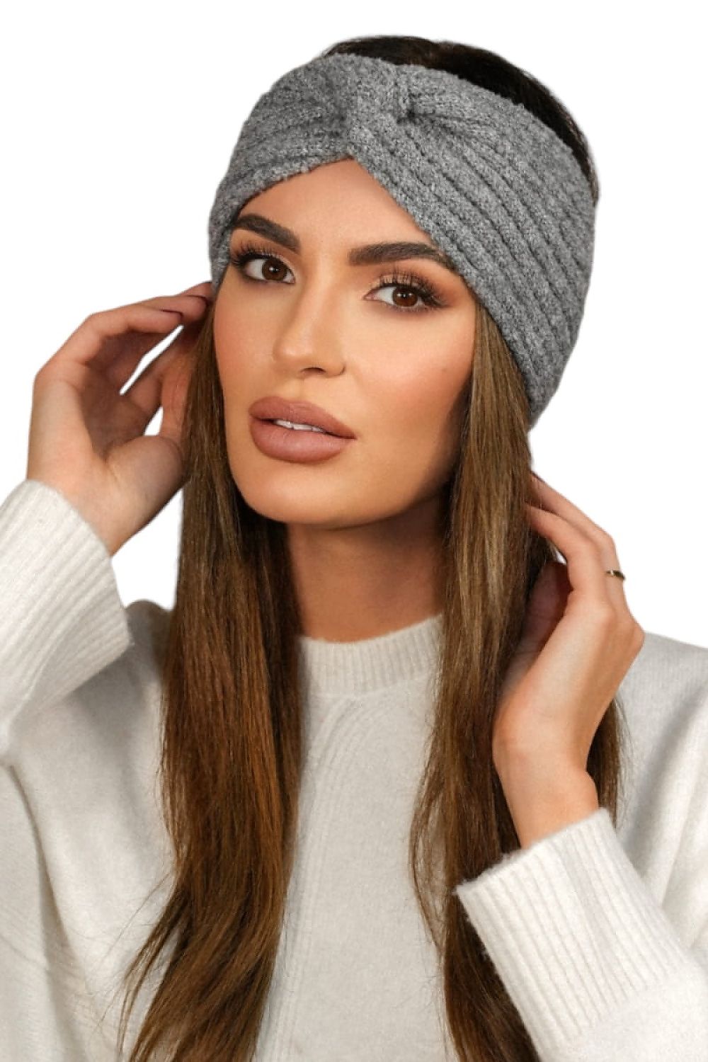 Stylish navy blue women's headband by Kamea arranged elegantly on a flat surface, emphasizing the soft texture and chic aesthetic ideal for autumn.