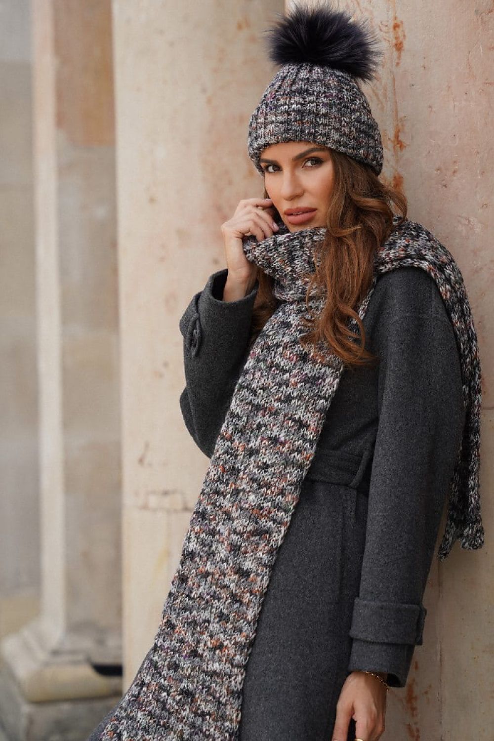 Close-up of Kamea Pavone hat's exquisite natural jenot pom-pom and sophisticated cuff detail, ideal for adding elegance to any winter outfit.