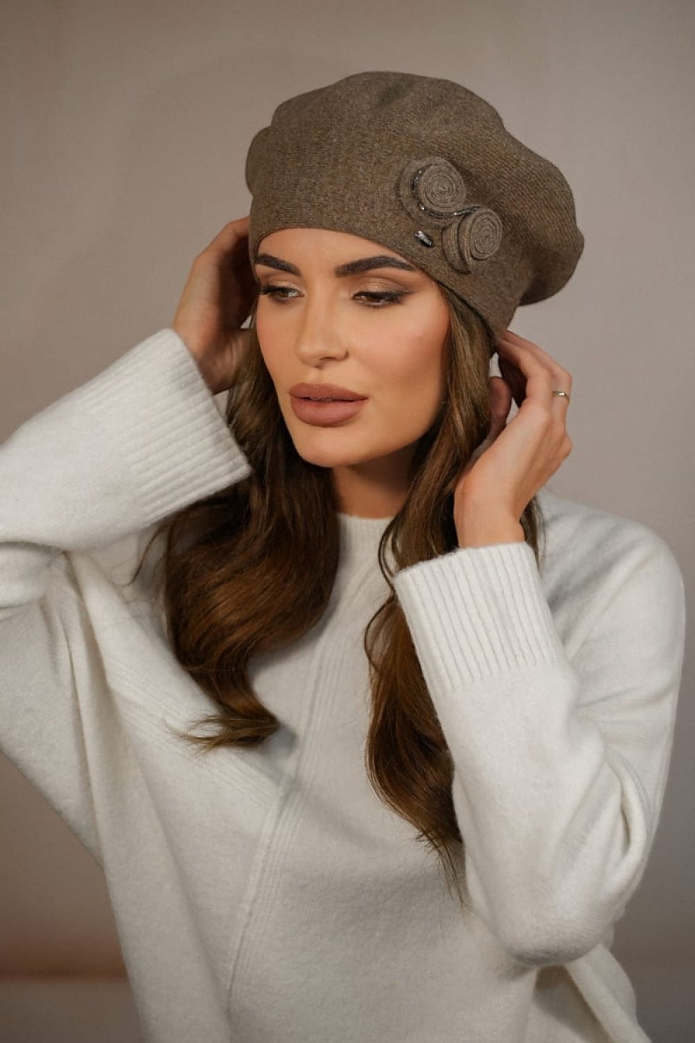 Kamea Light Brown Wool Beret styled elegantly with complementary winter accessories, exemplifying a chic and cohesive look for women seeking warmth and sophistication in their cold-weather wardrobe.