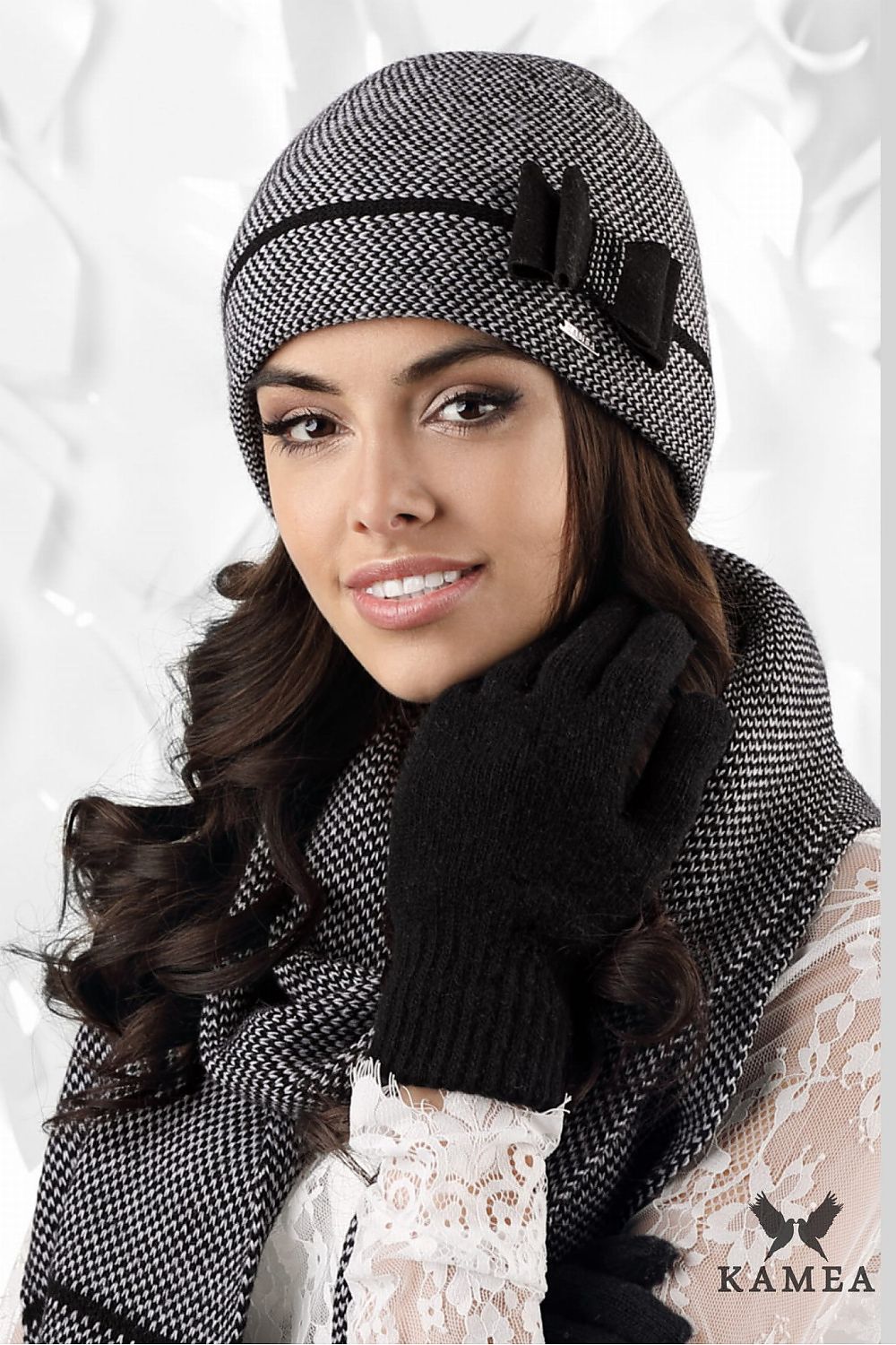 Kamea Bologna Women's elegant black hat featuring a stylish houndstooth pattern and decorative bow, crafted from premium alpaca wool and viscose for luxurious comfort.