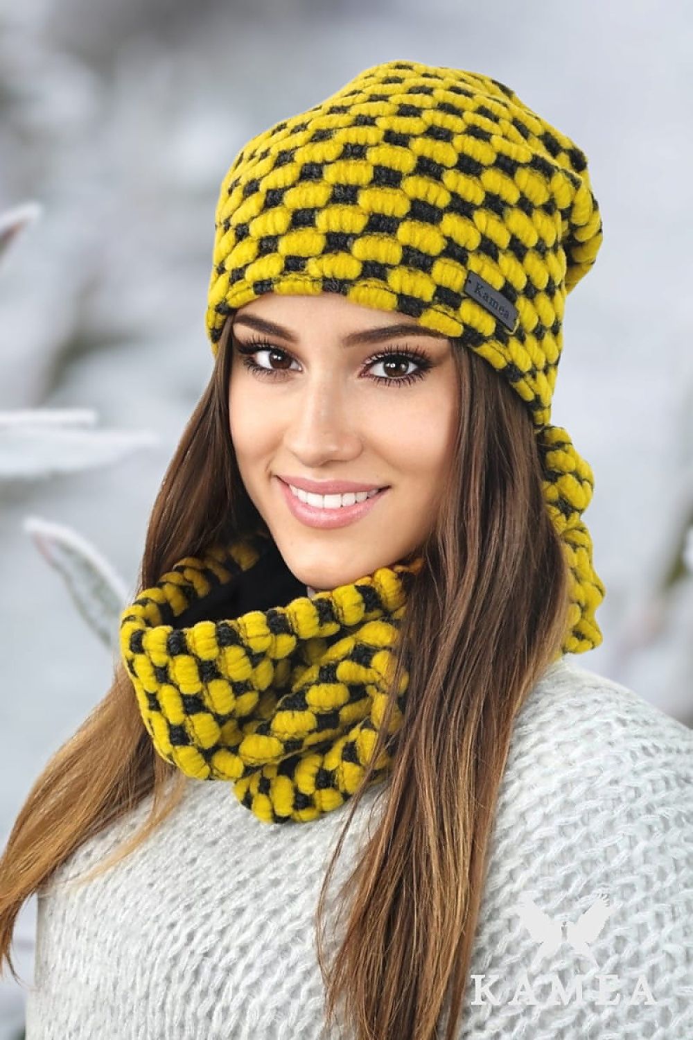Elegantly styled Kamea Boston Winter Set in honey colour featuring a luxurious polar hat and tube scarf, designed for warmth and comfort in cold weather.