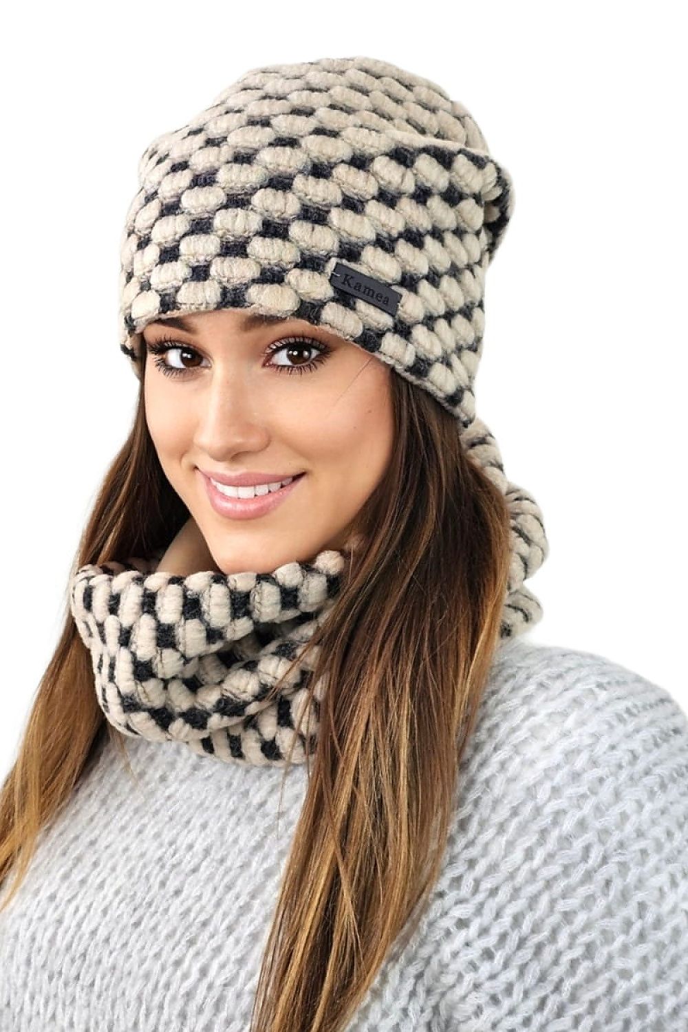 Stylish woman wearing the Kamea Boston Winter Set, featuring a chic honey colour hat and scarf while enjoying a winter day outdoors.
