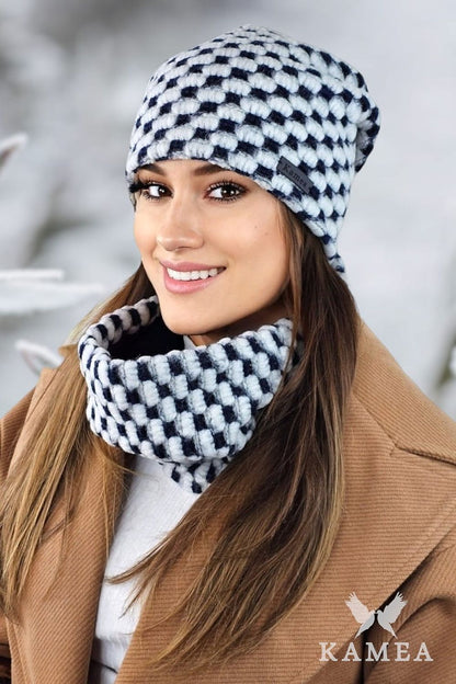 Kamea Boston Winter Set displayed elegantly, highlighting the craftsmanship of the eco leather logo and the rich texture of the hat and scarf.