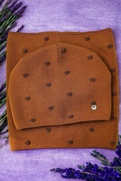 Kamea elegant red winter polka dot gorczyca hat, showcasing the luxurious soft viscose blend design with subtle raised details.