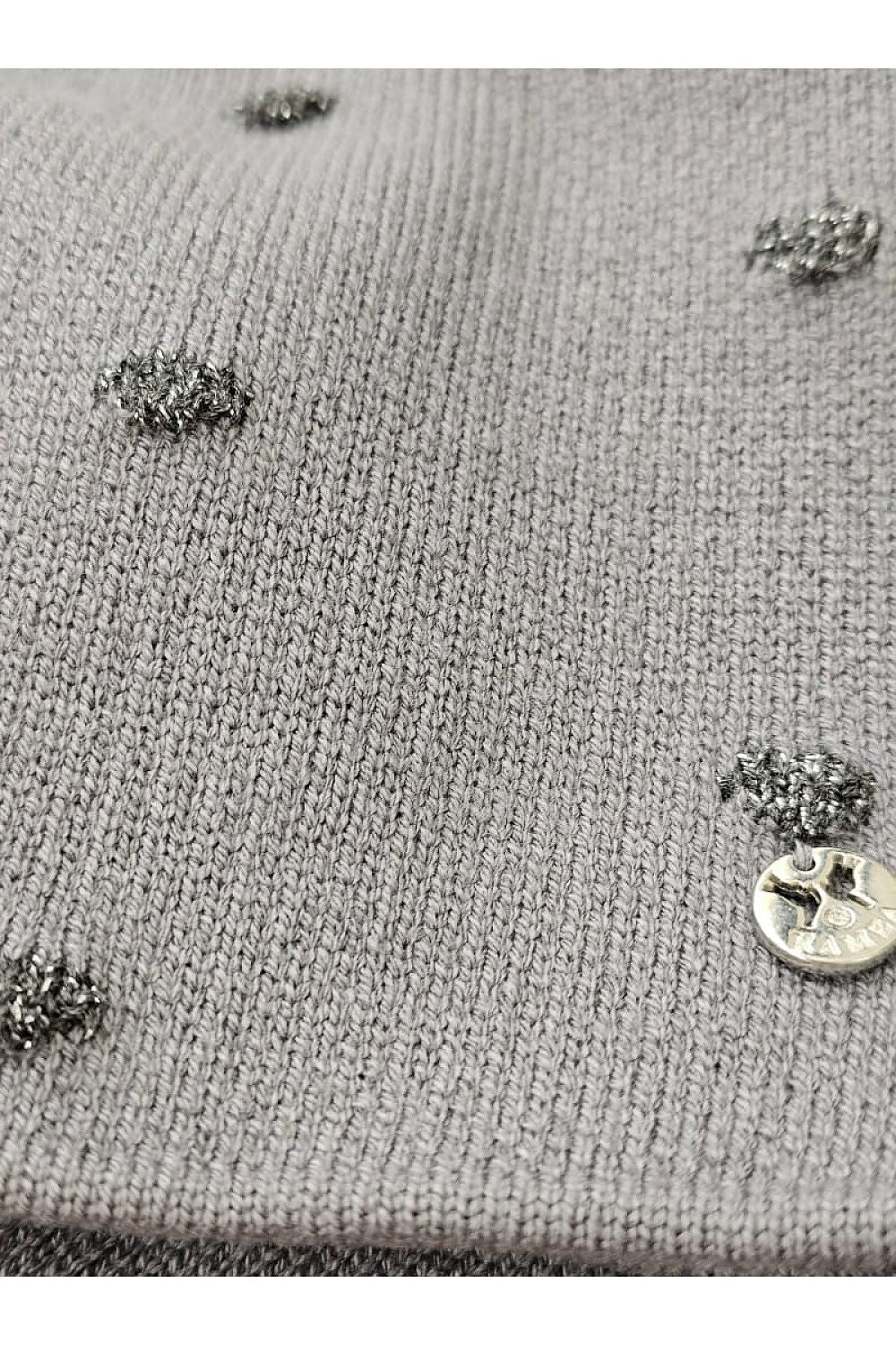 Kamea's luxurious red winter gorczyca hat displayed against a backdrop of winter fashion, showcasing its versatility and elegant design.