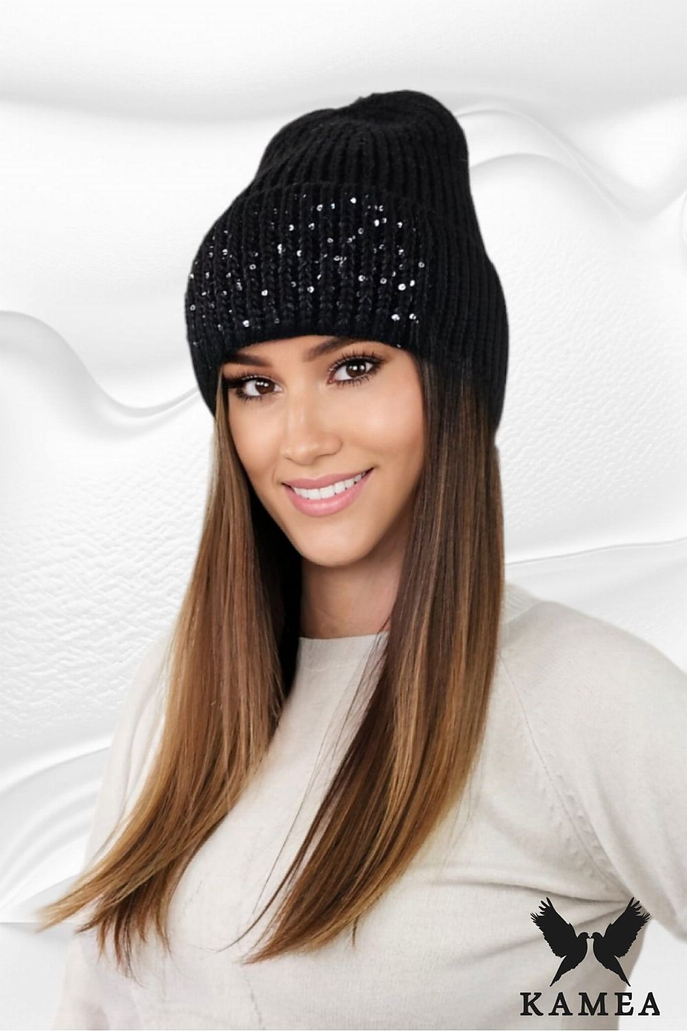 Stylish GINNY Winter Hat by Kamea - Fashionable gray knit beanie featuring a thick cuff, perfect for adding sophistication to winter attire.