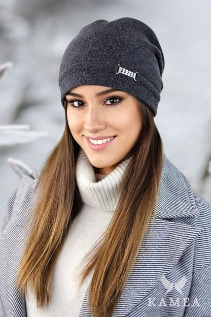 A model wearing Kamea Luxury Women's Woolen Hat in Ash Rose, highlighting the comfort and warmth of high-quality wool.