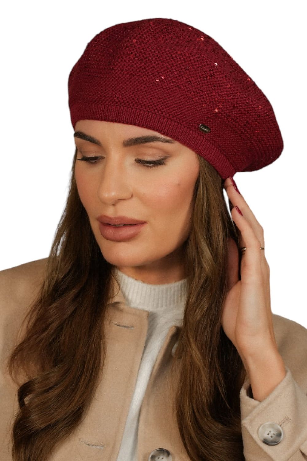 Close-up of Kamea's sequin beret with a rich raspberry polar lining, capturing its exquisite detail and shine.