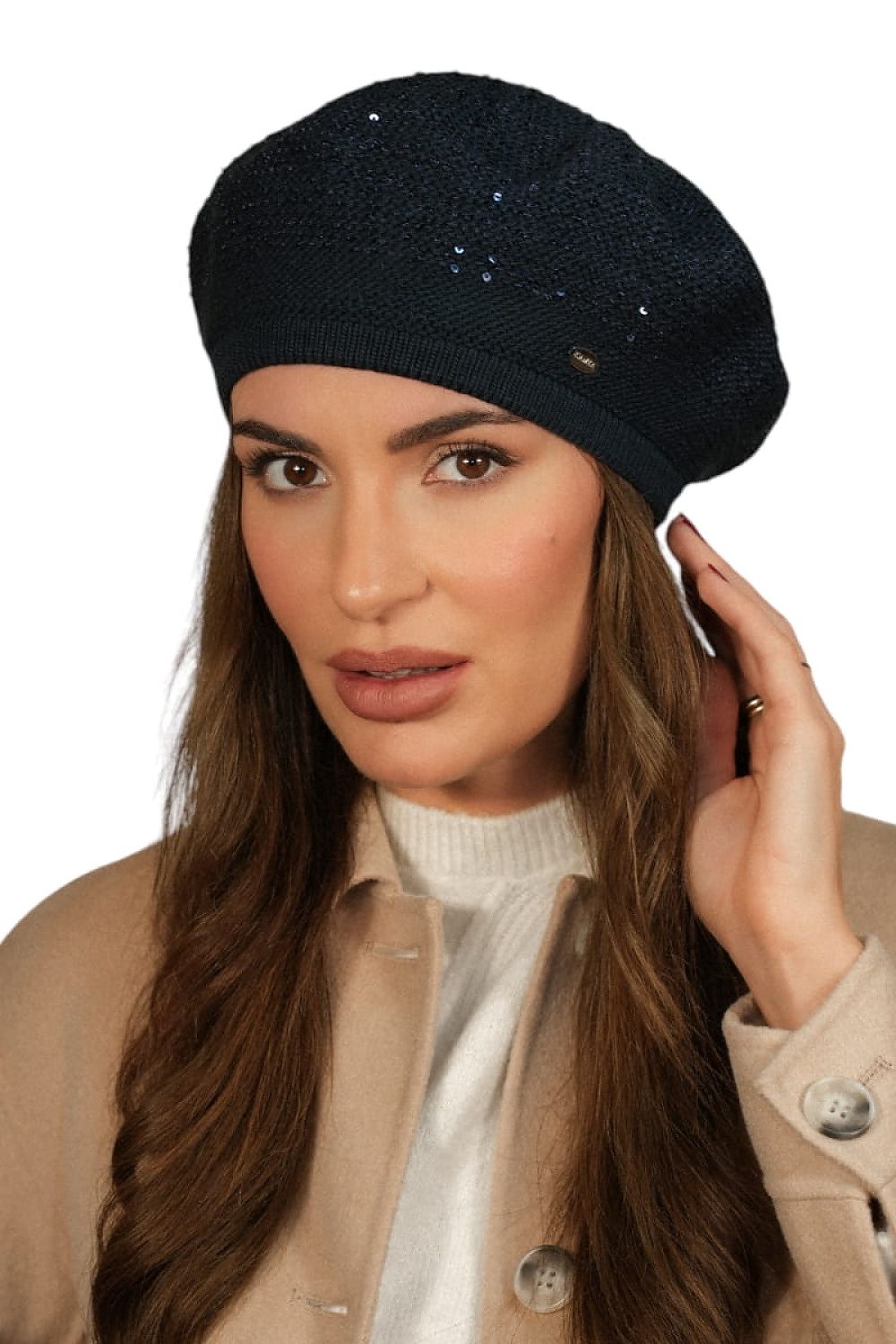 Stylish model wearing Kamea Peony sequin beret, showcasing the blend of comfort and fashion for cold weather.
