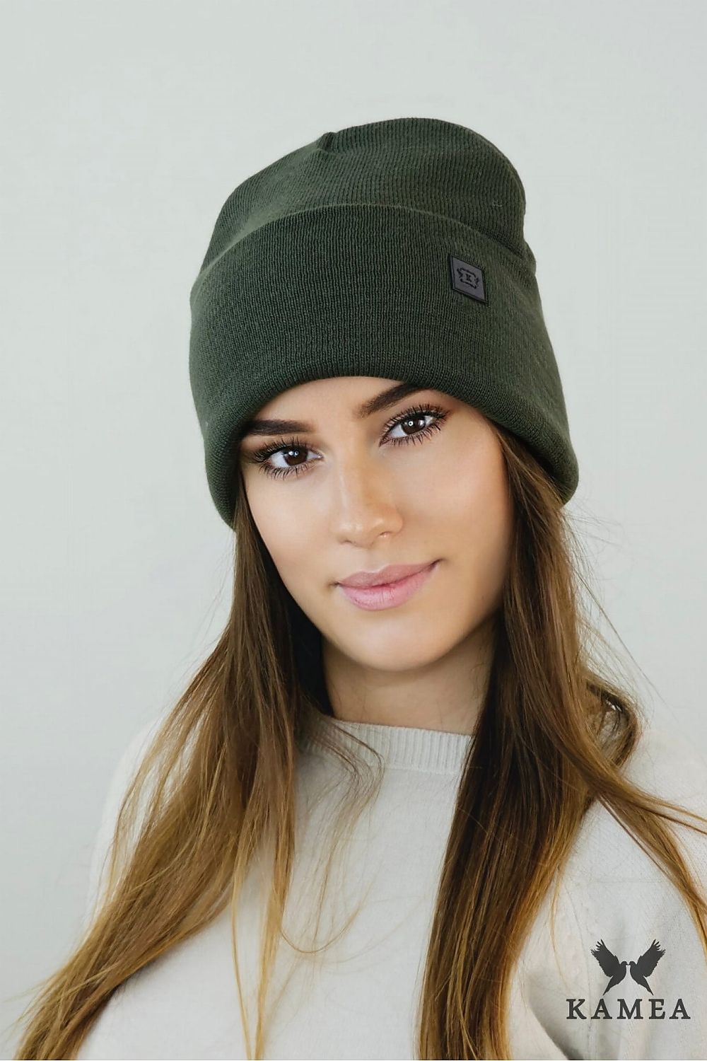 SALLY Khaki Beanie Hat by Kamea showcasing luxurious warmth with eco-leather patch, perfect for autumn-winter styles.
