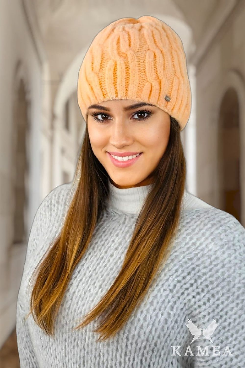 Model wearing the GIZMA Fluffy Olive Winter Hat by Kamea, highlighting the stylish fit and warmth for cold days.