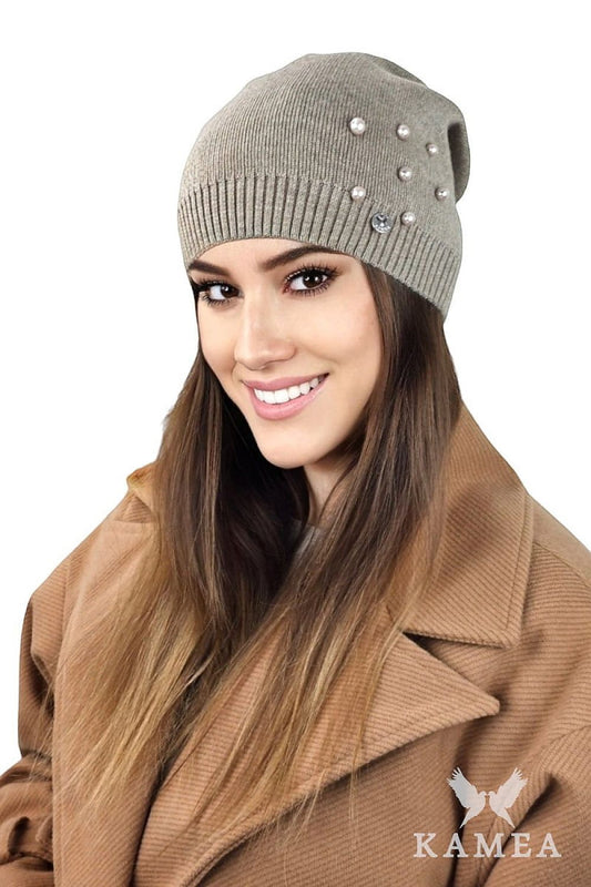Elegant Kamea luxury dark beige Kalcyt winter hat adorned with hand-sewn glass beads, showcasing high-quality craftsmanship and a perfect fit for sophisticated winter styles.