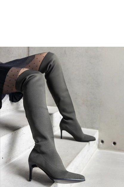 Luxurious women's green stiletto heeled boots from Solea, showcasing a pointed toe and comfortable slip-on style, ideal for cold weather.