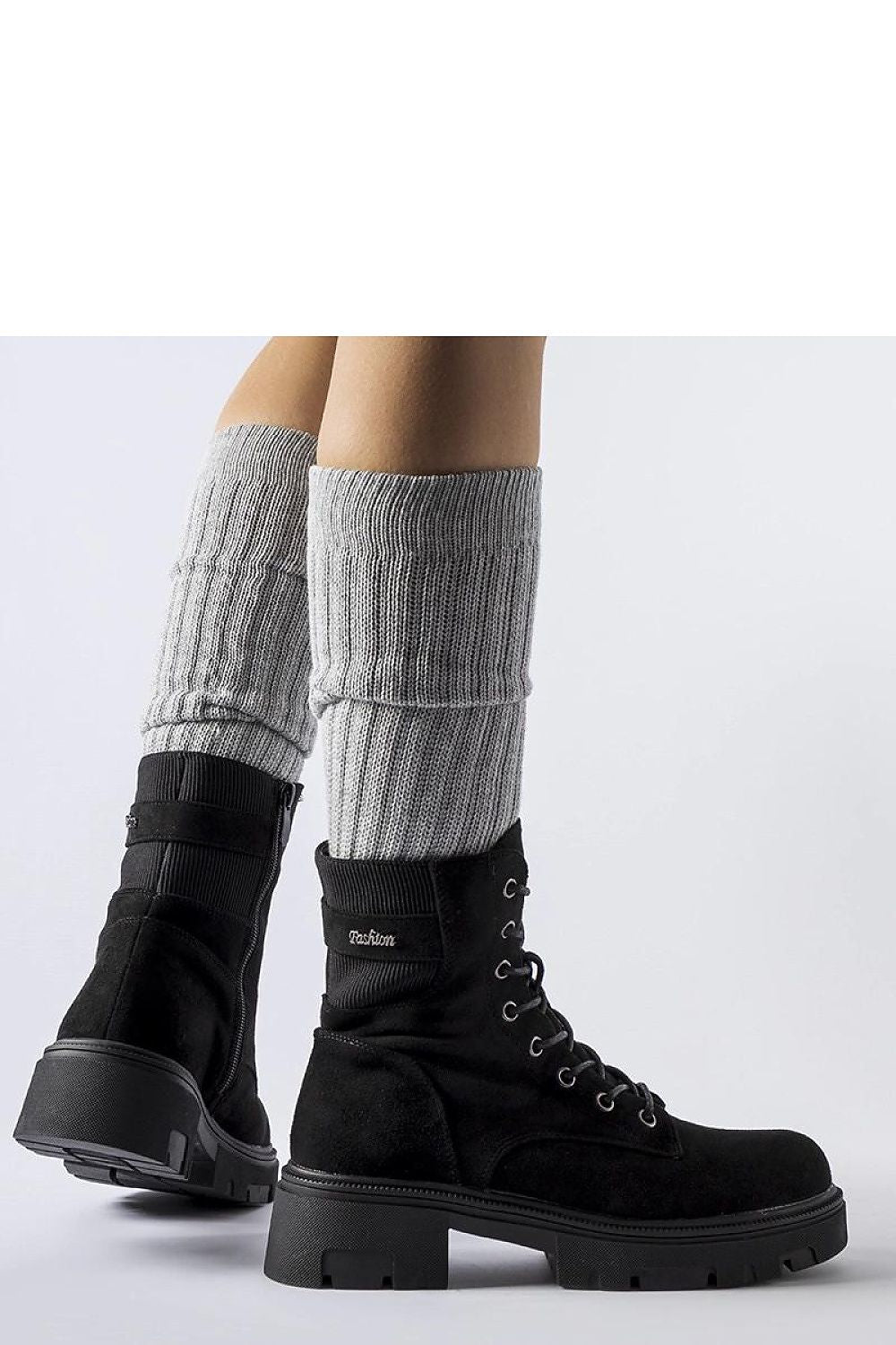 Solea black eco-suede Cunha boots, featuring a modern ankle height and insulated for warmth, ideal for stylish winter walks.