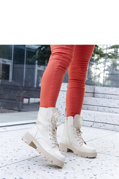 Elegant Accadia beige insulated lace-up boots featuring decorative beads, designed for comfort and style by Solea.