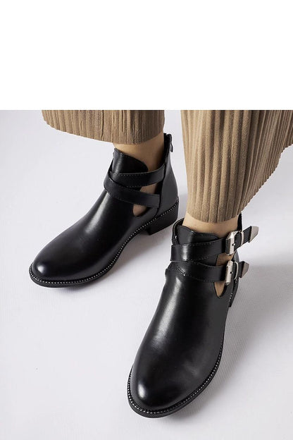 Chic Solea Black Cut-Out Boots in eco leather with a 13 cm height and distinctive buckles, a must-have for modern luxury wardrobes.