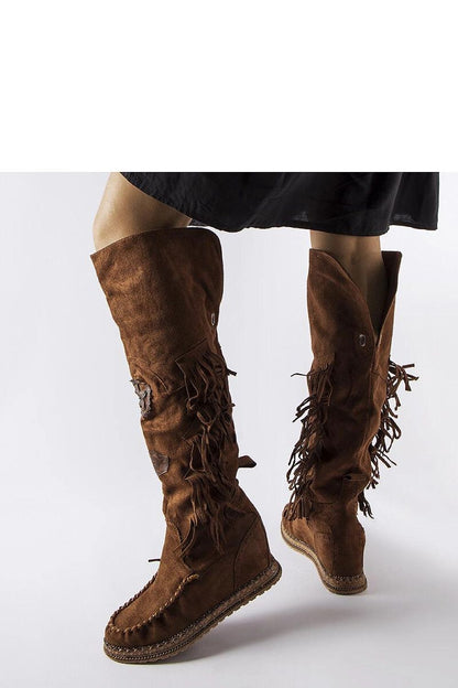 Solea Cascia Brown Fringed Platform Boots highlighting the luxurious tassel details and comfortable slip-on fit for modern women.