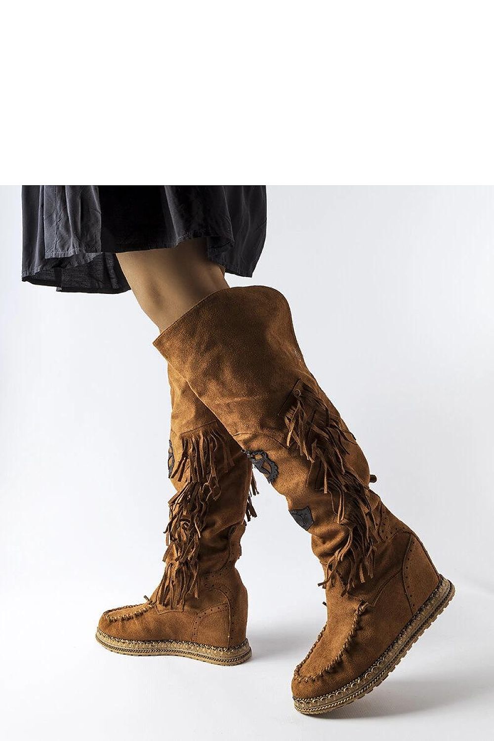 Stylish Solea Cascia brown fringed platform boots with a cosy slip-on design, perfect for fashionable winter looks in eco leather.