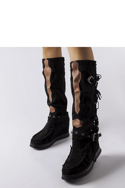 Close-up of Solea brown covered-heel buskin boots, highlighting the 8 cm heel, luxurious eco-leather finish, and standout detail, ideal for chic autumn fashion.