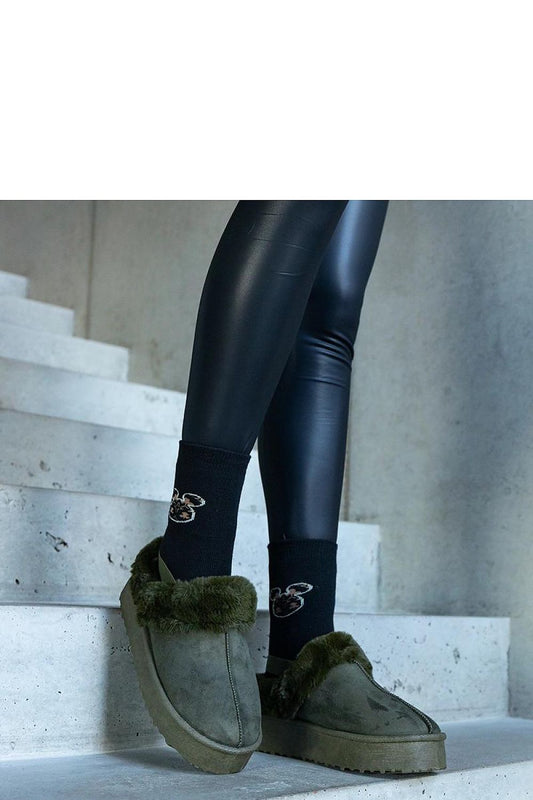 Stylish Solea green slippers with a round nose design, perfect for adding a touch of elegance to your winter wardrobe.