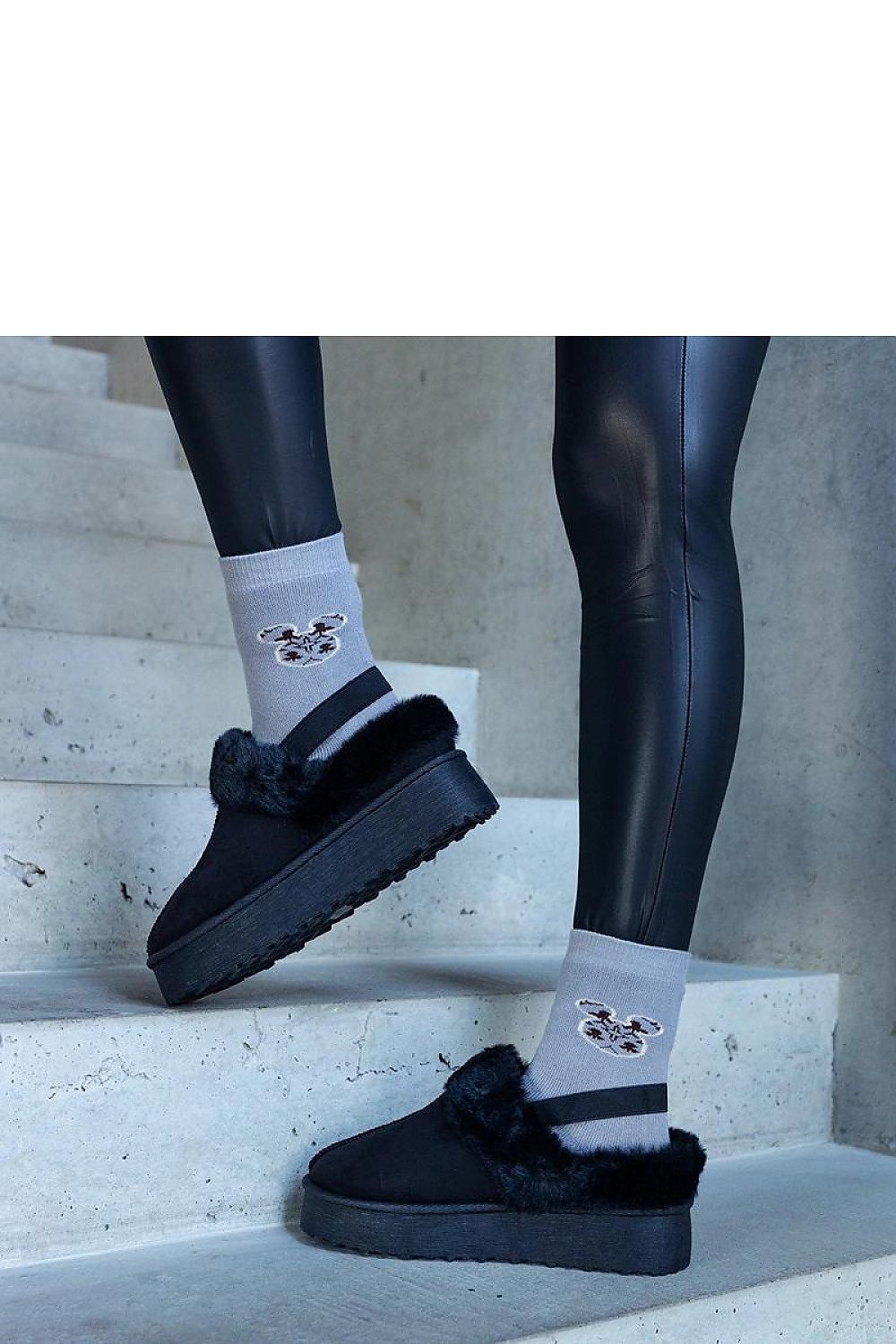 Chic green fur-trimmed platform slippers by Solea, designed for ultimate comfort and warmth during the colder months.