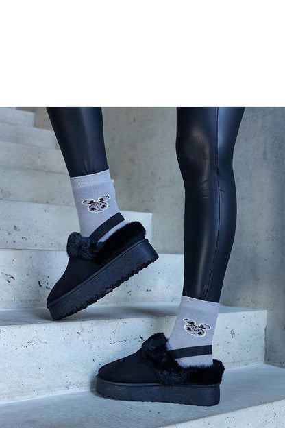 Chic green fur-trimmed platform slippers by Solea, designed for ultimate comfort and warmth during the colder months.