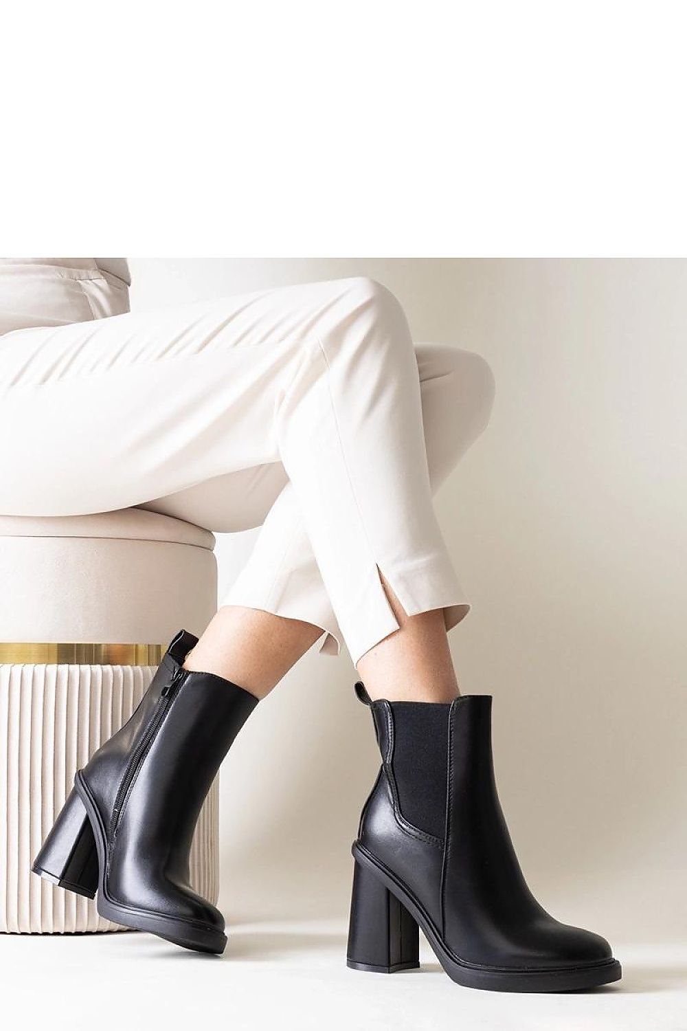 Elegant Almase black eco leather stiletto boots from Solea, featuring a sleek zipper closure and a comfortable rubber sole, perfect for all occasions.