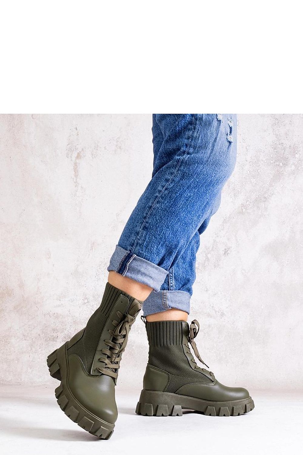 Elegant Solea Green Zogba Boots with eco leather finish, designed for versatile outfits, combining luxury and practicality for the modern woman.