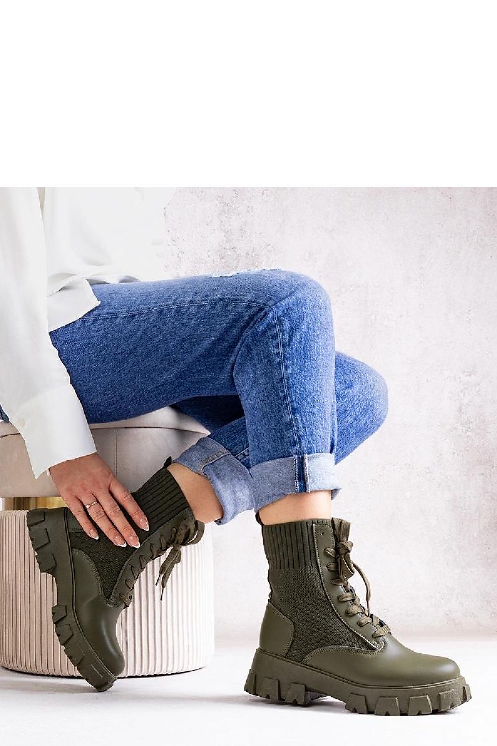 Close-up of Solea Green Zogba Boots highlighting the slip-on closure and durable rubber sole, ideal for warmth and comfort during cold seasons.