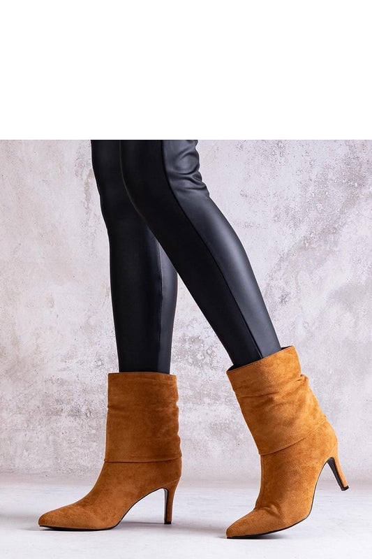 Elegant brown stiletto heeled boots for women from Solea, crafted in eco leather, offering comfort and insulation for autumn and winter.