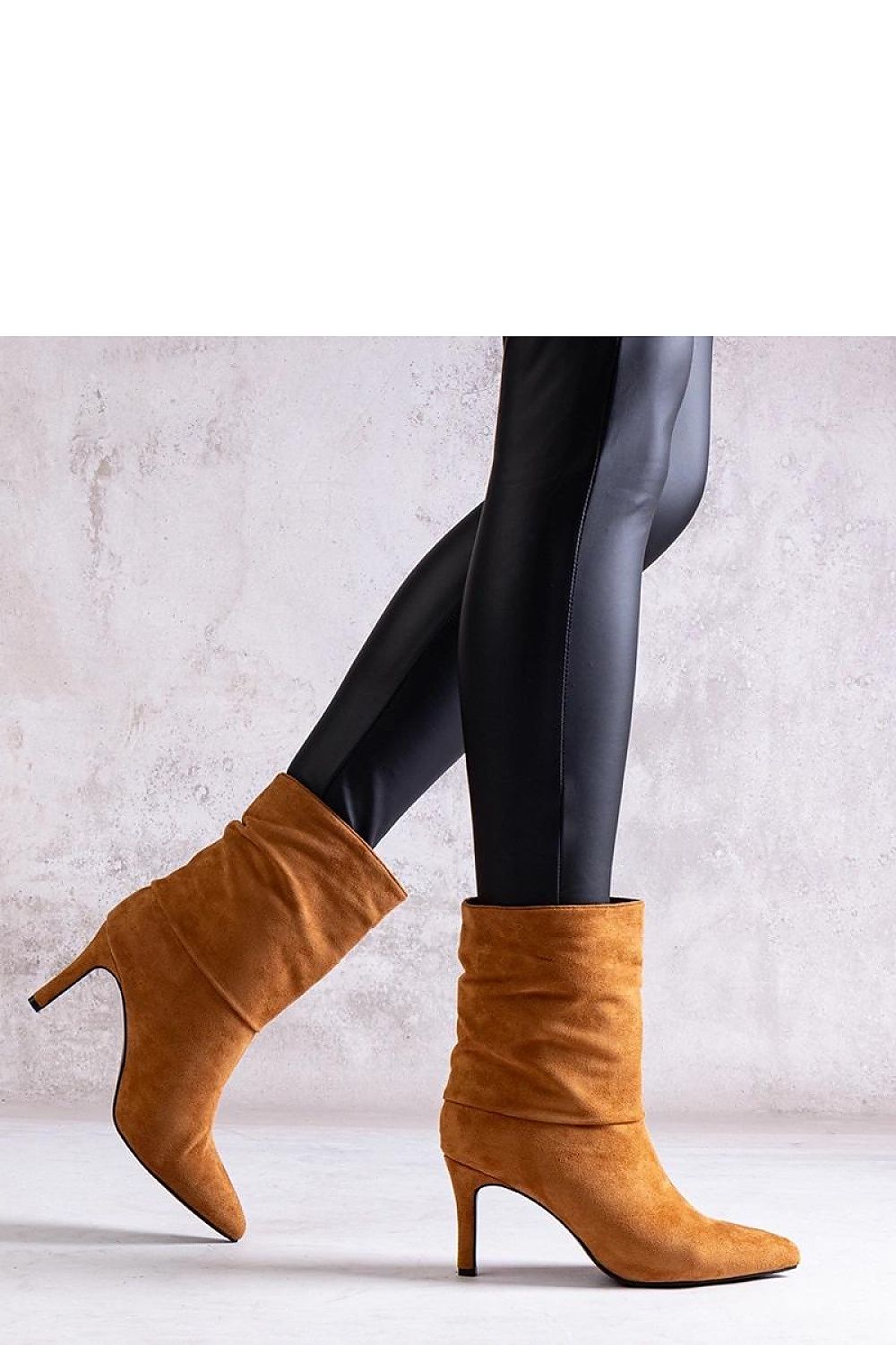 Luxurious brown stiletto heeled boots from Solea, perfectly designed for women's comfort and fashion, ideal for seasonal styling.