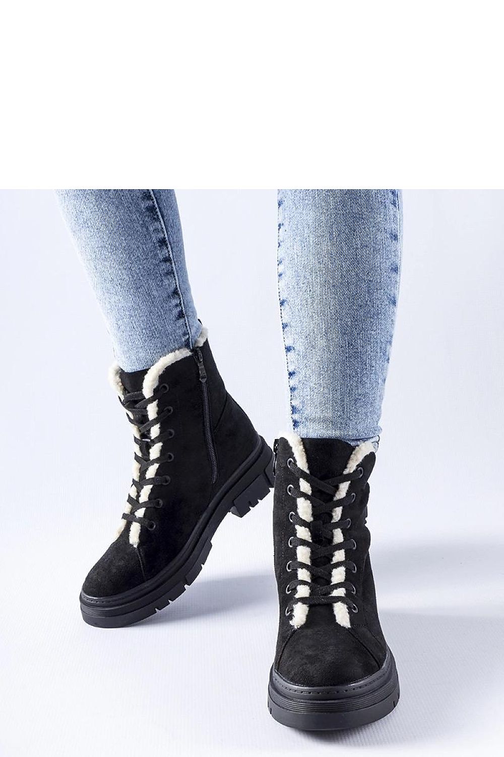 Solea Pompei Black Eco-Suede Insulated Boots displayed on a textured surface, highlighting their fashionable design and practical insulation.