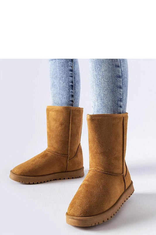 Solea Brown insulated snow boots for women, showcasing style and comfort with a round toe, elegant platform, and sturdy rubber sole, perfect for winter wear.