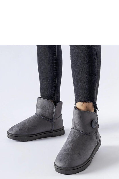 Elegantly designed Solea insulated snow boots in grey, showcasing a stylish slip-on design ideal for winter fashion and outdoor activities.