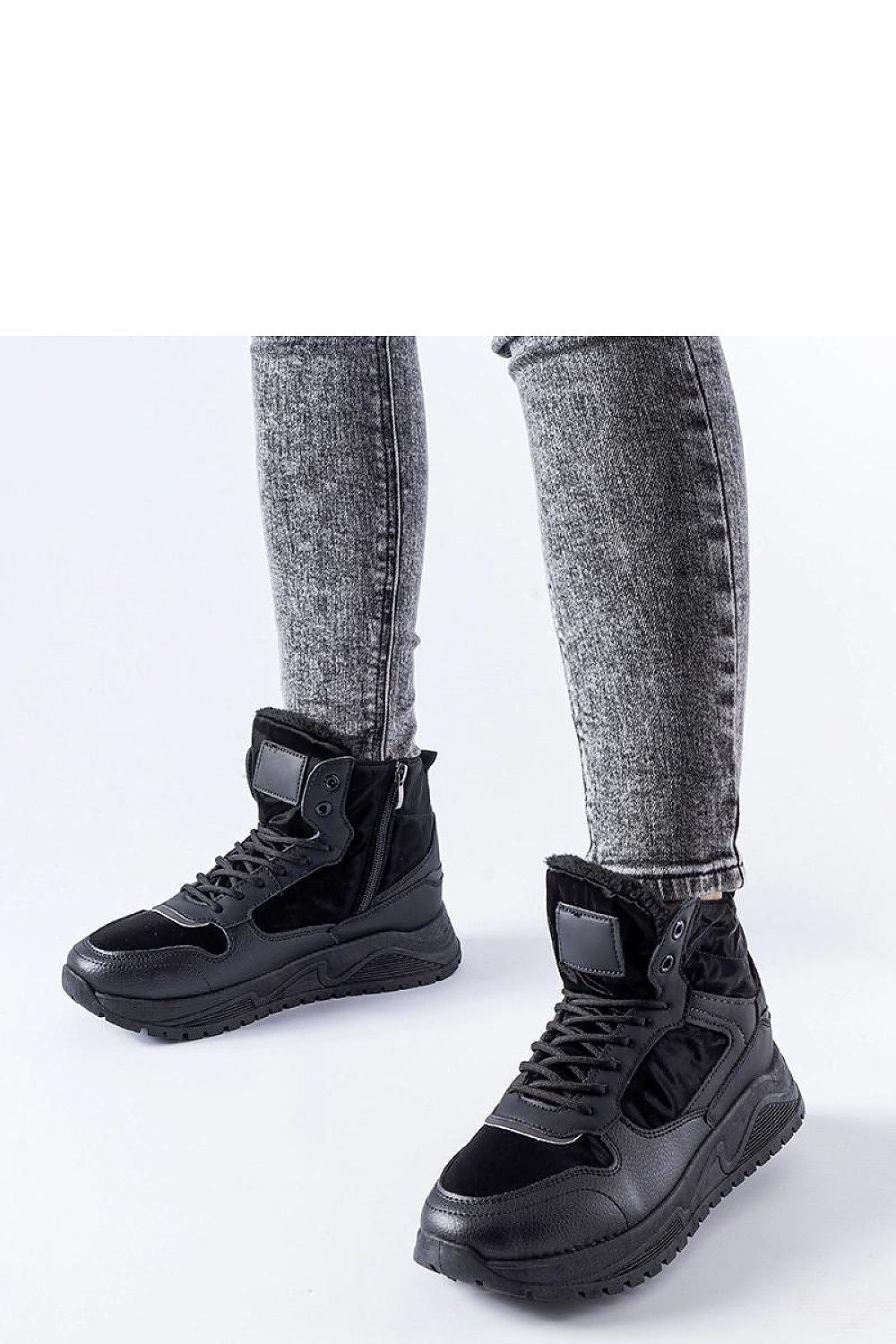 Solea black insulated high-top Malles sneakers elegantly showcasing their stylish design perfect for winter wear.