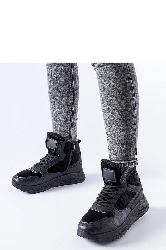 Solea black insulated high-top Malles sneakers elegantly showcasing their stylish design perfect for winter wear.