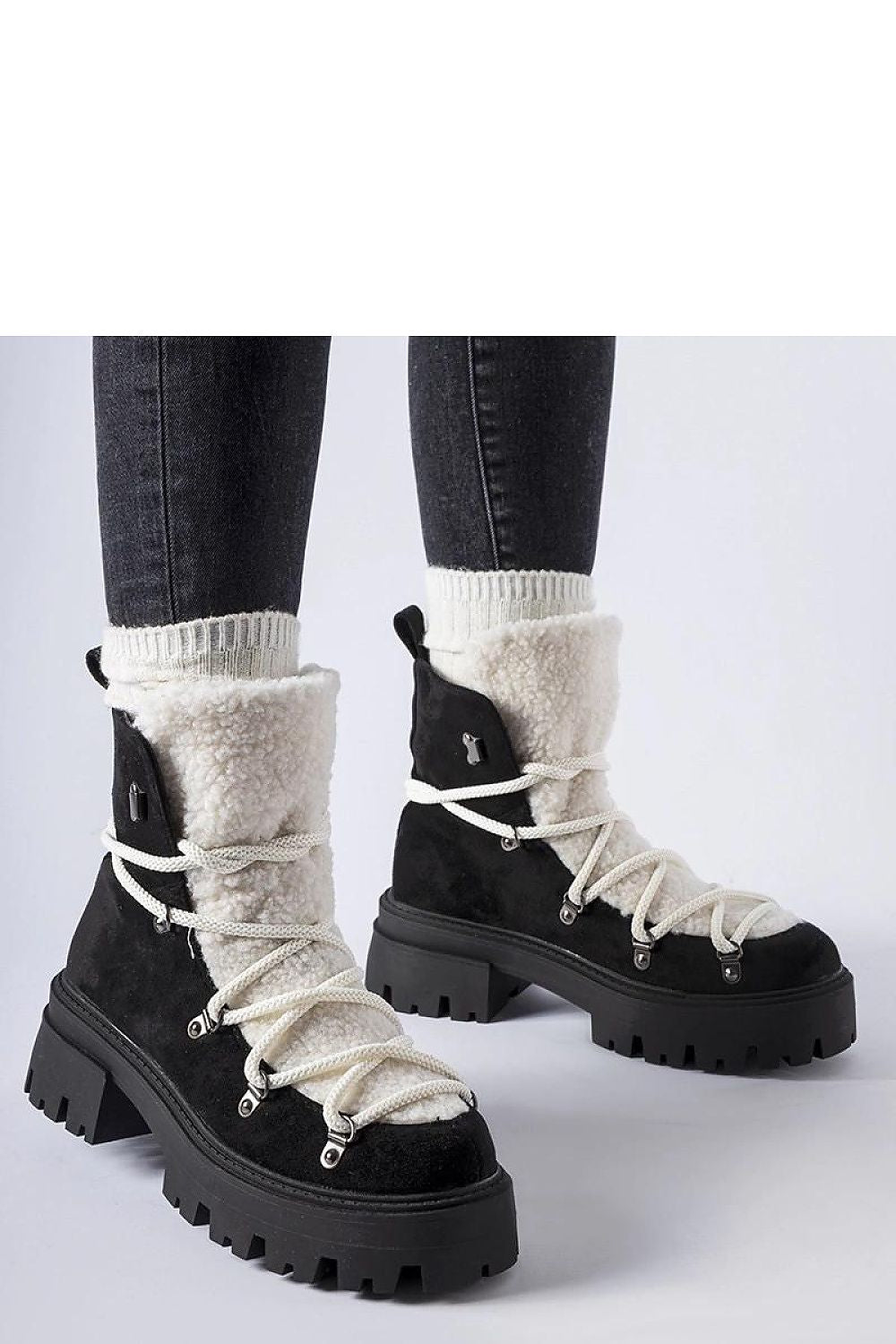 Luxurious black Perugia ankle baggers by Solea featuring a stylish lace-up design and comfortable rubber sole, perfect for winter fashion.