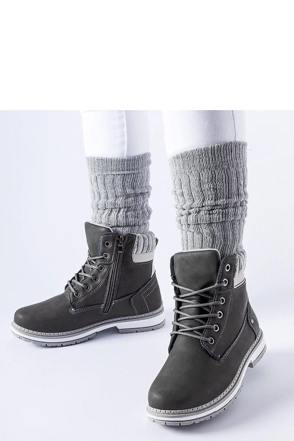 Luxurious Solea Perillard trapper boots, designed with a moisture-resistant exterior and plush insulation, perfect for cold days.