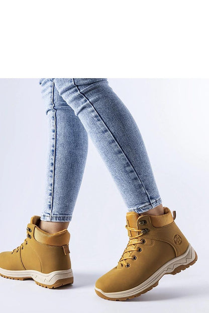 Elegant caramel insulated Guarcino trappers by Solea, showcasing high uppers, eco leather finish, and practical rubber soles for winter comfort and style.