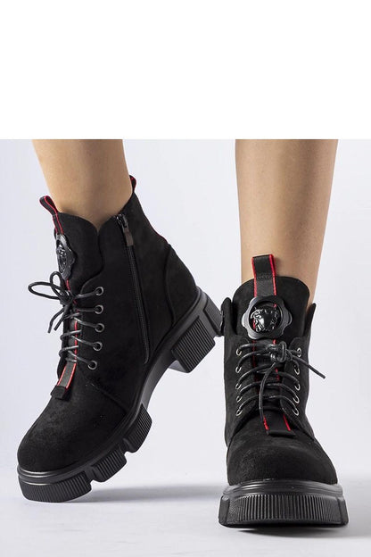 Chic Monrency insulated black boots featuring a practical side zipper, perfect for effortless wear on cold days.