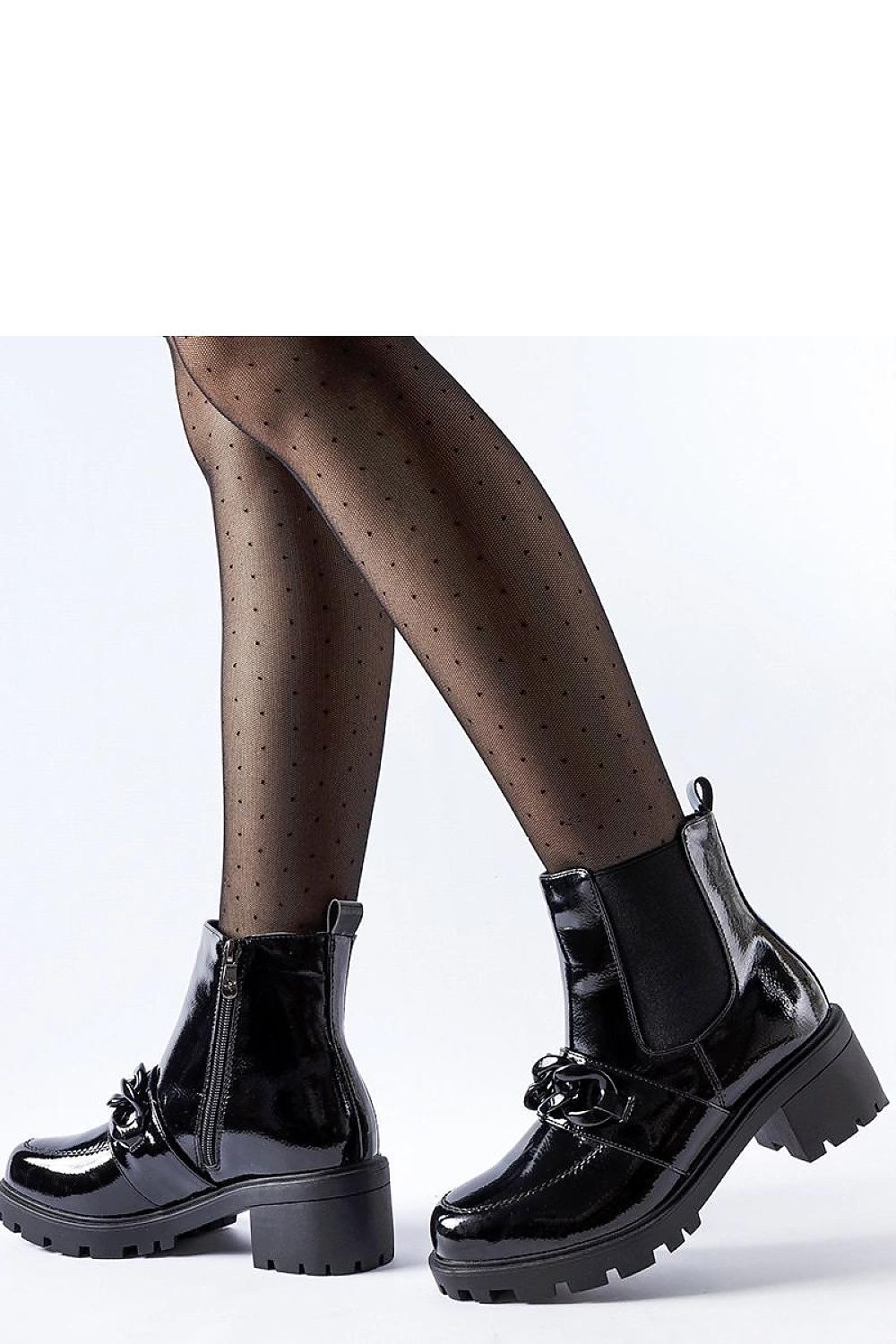 Solea black ankle boots with a robust rubber sole, demonstrating superior traction and elegant style for colder seasons.