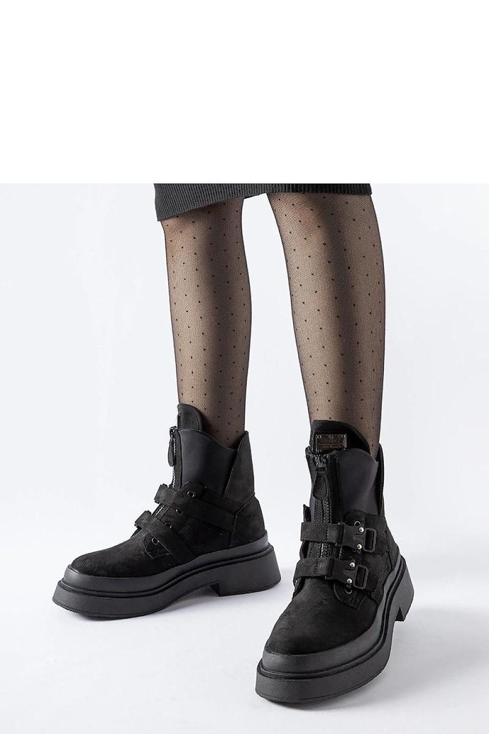 Solea luxurious Black Glen platform boots featuring elegant buckles, designed for chic winter looks, showcasing eco-leather, perfect for pairing with skirts or jeans.