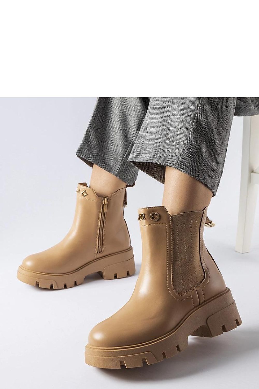 Solea's fashionable Federica beige boots showcasing a sophisticated design with insulated interior, side zipper for easy wear, and a blend of style and functionality.