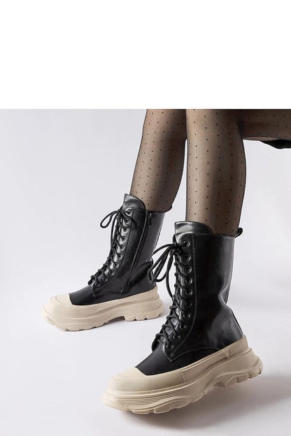 Chic Solea Women's Black Eco Leather Boots featuring a modern round toe and robust beige soles, perfect for autumn and winter flair.