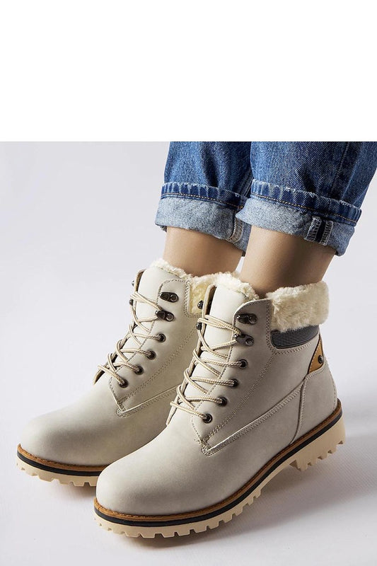 Elegant Montalbino Ankle Trapper Boots by Solea featuring a flat heel, round toe, and chic aesthetic for fashionable winter outings.