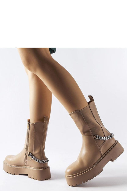 Luxurious Solea Beige Eco-Leather Chain-Embellished Boots showcasing elegant design, perfect for winter styling, sizes EU 36-41, US 5.5-10.5, featuring comfortable flat heels and decorative chains.