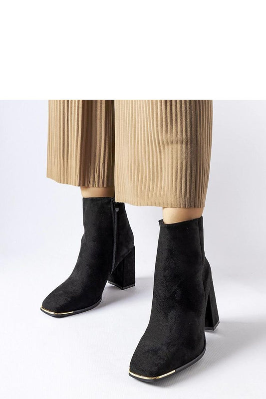 Solea Black Cheney stiletto boots featuring a sleek design with a 9 cm heel, crafted from eco leather, perfect for a warm and elegant winter look.