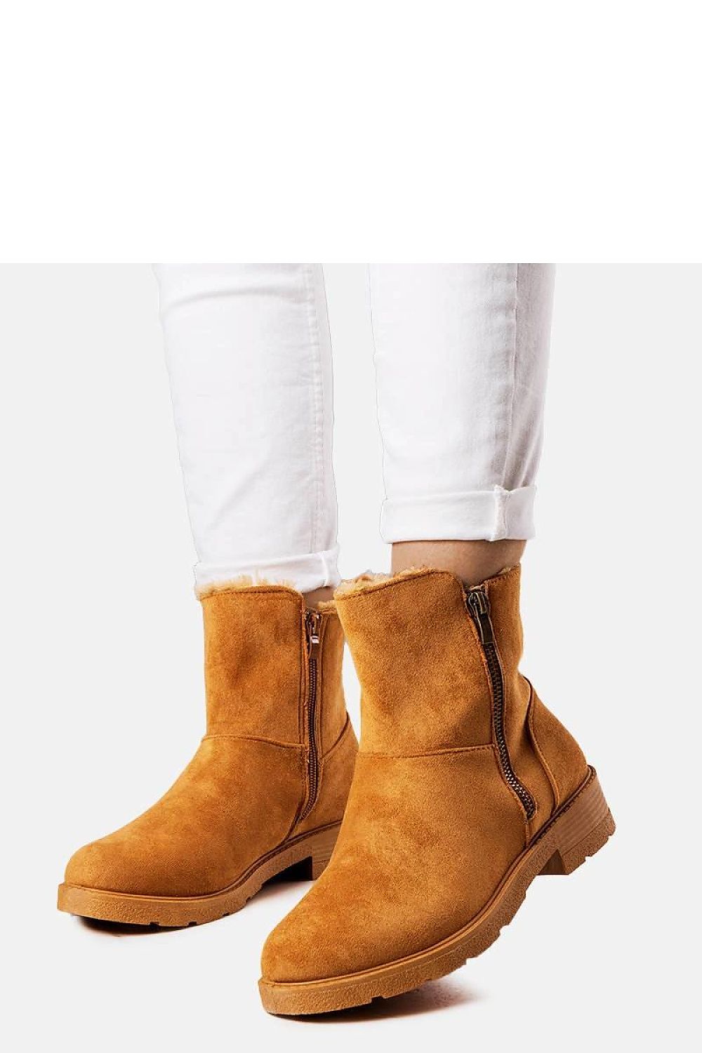 Close-up of the durable sole and zipper detail of luxury brown suede Salona boots, showcasing exceptional craftsmanship, crafted by Solea.