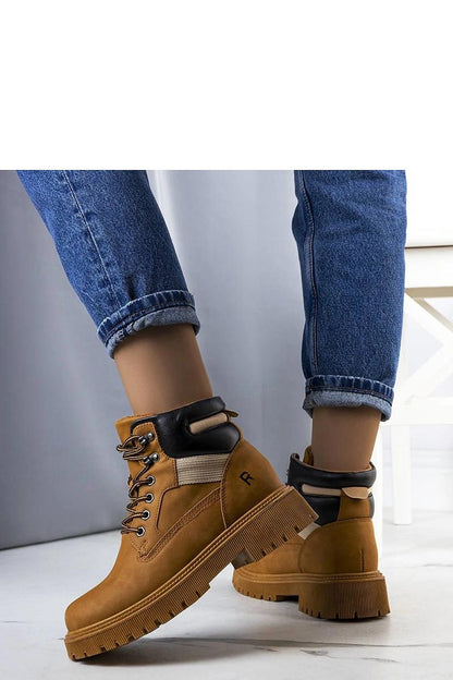 Sophisticated Solea Brown Nadel Trapper Boots, designed for active women, combining fashion with functionality in colder weather.